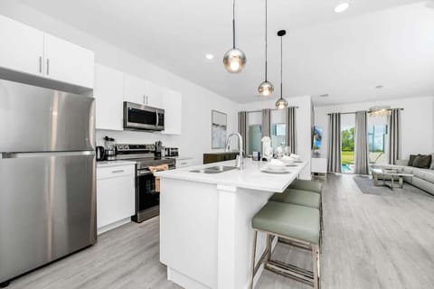 Cook up a storm in a kitchen stocked with all the essentials and modern appliances.