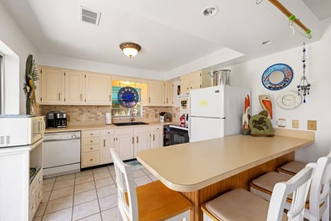 Open floor plan with full kitchen