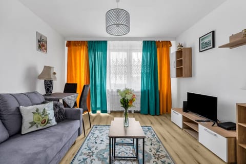 Living Room with Sofa Bed, Smart TV and Dining Table | Book Now with RENTUJEMY.COM