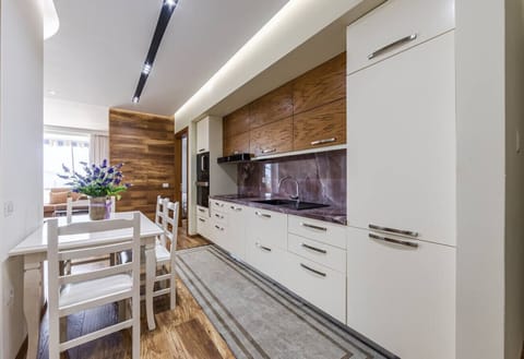 Fully-equipped kitchen and dining area