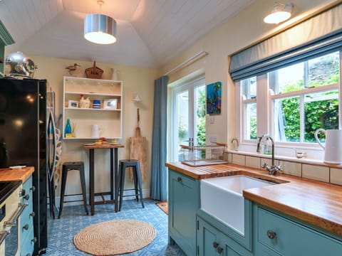 Interior Design, Furniture, Countertop, Kitchen, Cabinetry, Kitchen Appliance, Flooring, Wood, Major Appliance, Ceiling