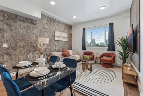 Dine in comfort at a chic four-person dining area just steps from the kitchen.