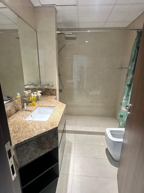 Shower, towels, soap, shampoo