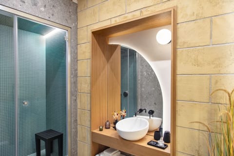 Deluxe Double Room, Balcony, City View | Bathroom | Hair dryer, slippers, towels, soap