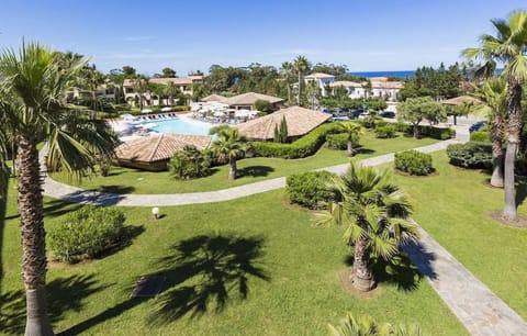 Wake up to views of vibrant gardens and the Corsican coastline from your private balcony or terrace.