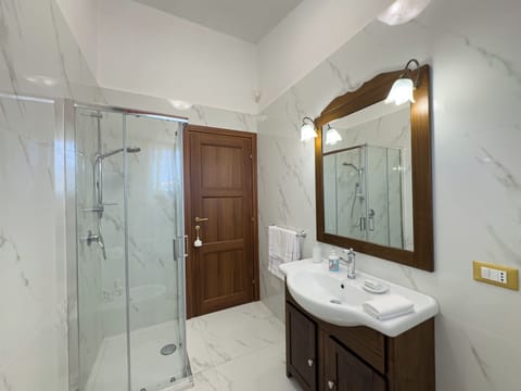 Double Room, Hill View | Bathroom | Shower, hair dryer, towels, soap