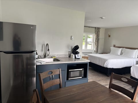 Includes a kitchenette with essentials for easy in-room meals.