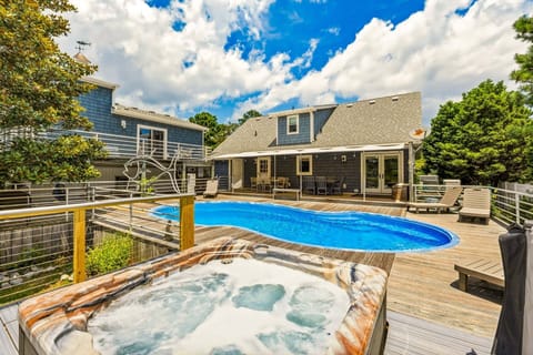 Relax by the sparkling Private Saltwater Pool or in the Hot tub surrounded by peaceful island vibes.