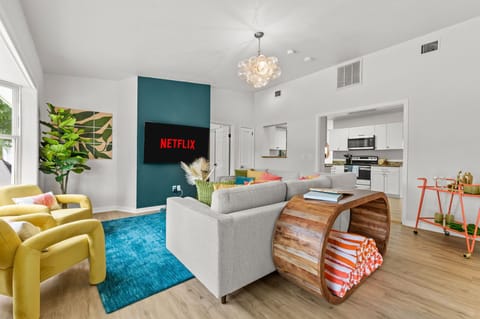 Open-concept living at its finest—our living room and kitchen are designed for togetherness.