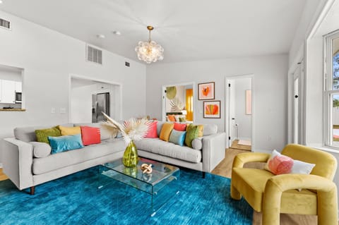 Soft, spacious, and oh-so-inviting—our living area offers plush seating for everyone.