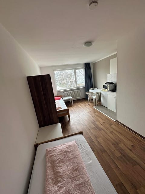 Twin Room | Individually furnished, iron/ironing board, free WiFi, bed sheets