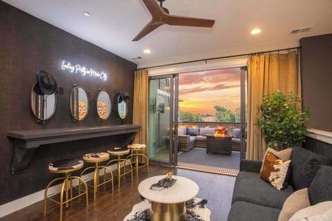 Top level: 2nd Hangout area with bar/makeup station, wet bar, Smart TV and Sleeper Sofa