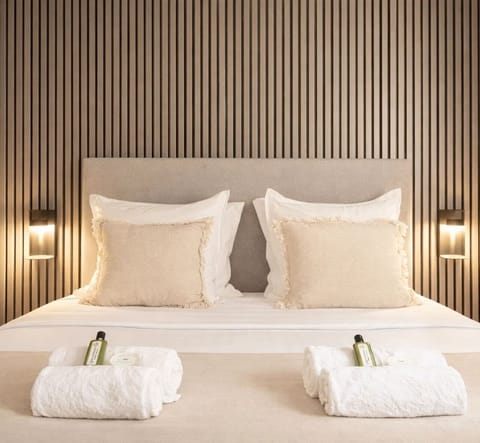 Deluxe Apartment, Courtyard View | Iron/ironing board, travel crib, free WiFi, bed sheets