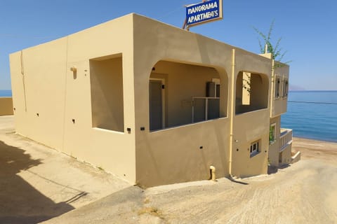 Property building with Sea in the Background
Charming path to the house with the Aegean Sea just beyond.

