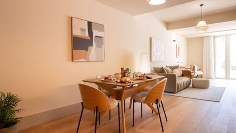 Start your mornings in style. This sleek and modern dining area, bathed in natural light, invites you to enjoy cozy meals with a view. #elegance #ModernLiving #CozyDining #InteriorDesign