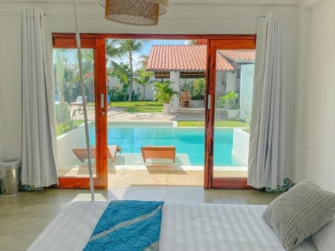 Deluxe Quadruple Room, Balcony, Pool View | Egyptian cotton sheets, premium bedding, individually decorated, desk