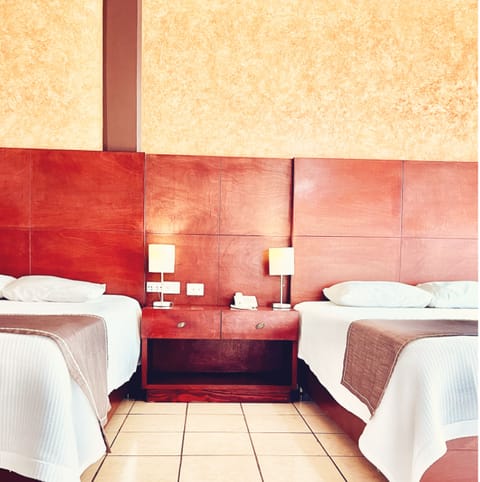 Family Quadruple Room | Individually furnished, desk, iron/ironing board, rollaway beds