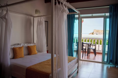 Family Quadruple Room, Balcony, Garden View | In-room safe, iron/ironing board (on request)