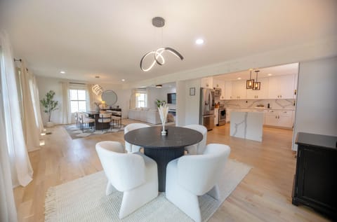 Dining area adjacent to kitchen and living room