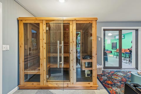 Sauna Retreat: Unwind in this stunning glass-front sauna, a perfect escape for relaxation!