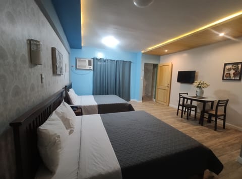 Deluxe Room, Non Smoking | Egyptian cotton sheets, premium bedding, desk, blackout drapes