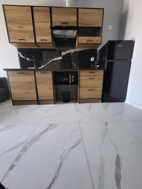 Deluxe Suite, Balcony | Private kitchen | Mini-fridge