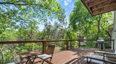 On the balcony: wind whispers, leaves hum, and your coffee companion might just be the breeze.