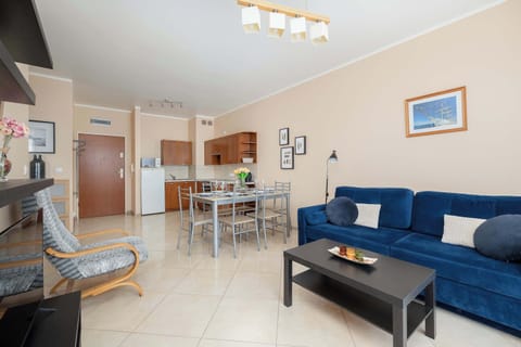 Another perspective on the bright space of the living area combined with the kitchenette.
