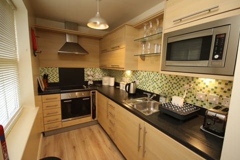 Fully equipped kitchen with dishwasher, oven, hob, microwave etc