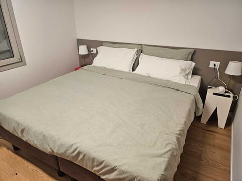 Superior Townhome, City View | Down comforters, minibar, in-room safe, laptop workspace