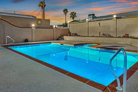 Relax and unwind in your private backyard oasis with pool.