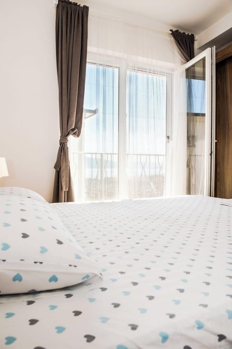 Apartment, Sea View | Laptop workspace, blackout drapes, iron/ironing board, free WiFi