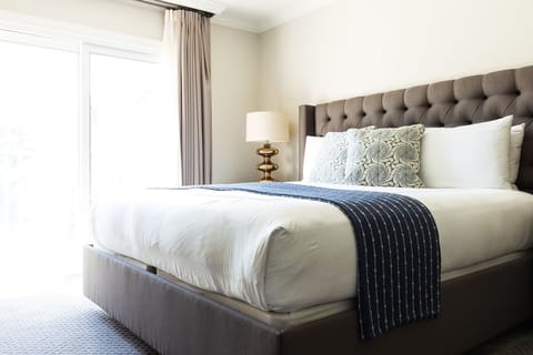 Sink into crisp linens for a restorative night’s sleep.