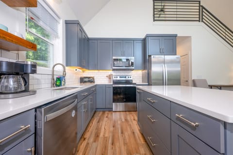 Kitchen-Cooking basics, stainless steel appliances, kitchen island for 3, coffee maker