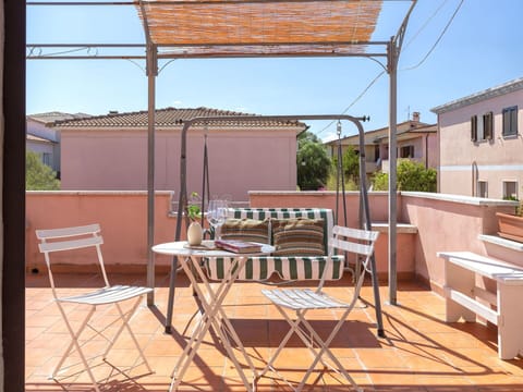 Furniture, Chair, Outdoor Furniture, Table, Balcony, Outdoor Table, Shade, Flowerpot, Houseplant, Kitchen & Dining Room Table