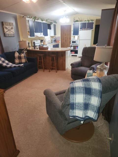 Another view of the open living room and kitchen area