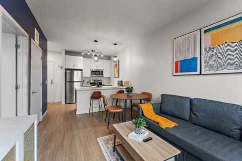 Living Room: Stylish space for relaxation with modern decor and a sunny dining area!