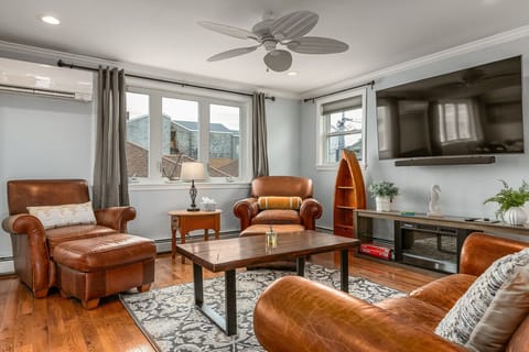 Living room with mini splits to cool off during the day at the beach.