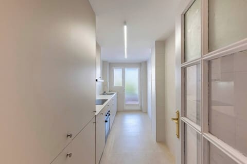 Kitchen with washer and ample storage. (4)