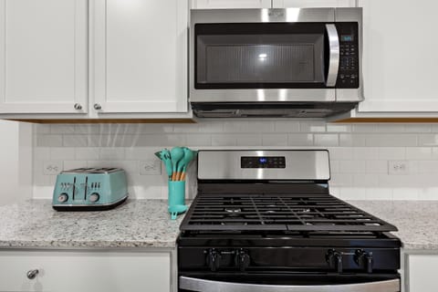 Stainless steel gas range & oven for effortless cooking. Built in microwave.