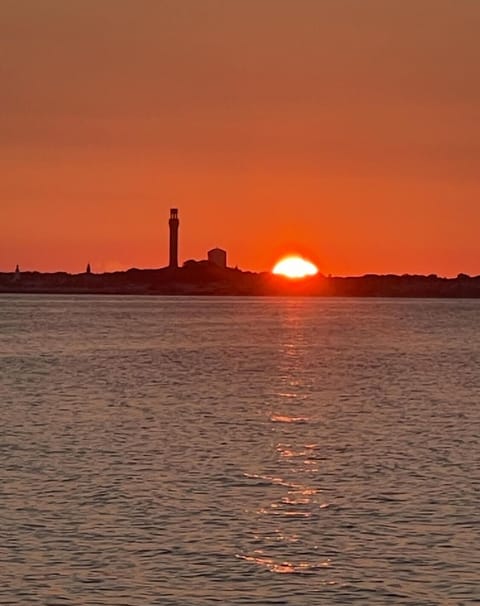Sunset of Provincetown over Cape Cod Bay