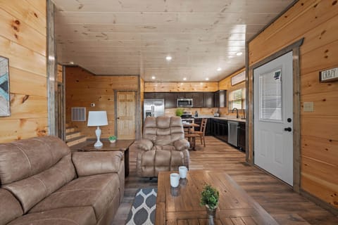 Rustic charm meets modern comfort in this bright and inviting living space.