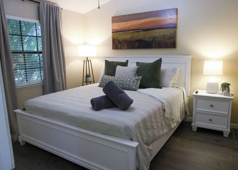 Bedroom 1: King size bed with 55 inch TV.