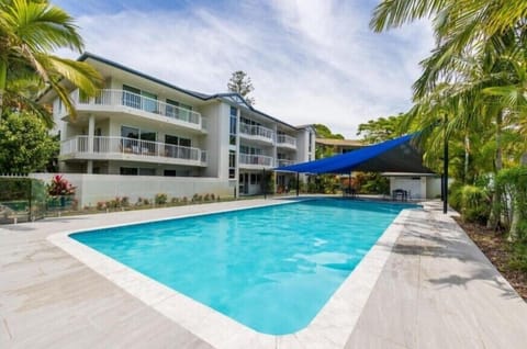 Take a dip in the large outdoor pool, perfect for cooling off or lounging in the sun.