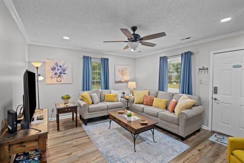 Living room with 55" Smart TV and board games