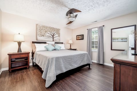 Private master suite w/ comfortable king bed, smart TV & ensuite full bathroom.
