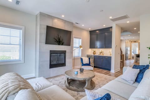 Living room with TV and comfy seating arrangement