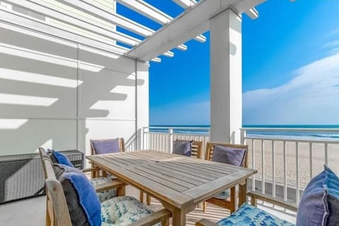 Relax with a cup of coffee or a glass of wine while enjoying serene balcony views.