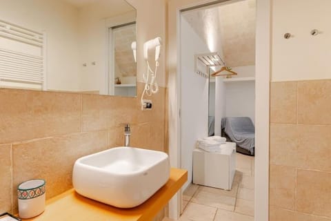 Economy Double Room | Bathroom | Shower, hair dryer, towels, soap