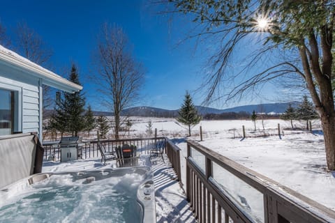 Take in a view of the slopes from the hot tub